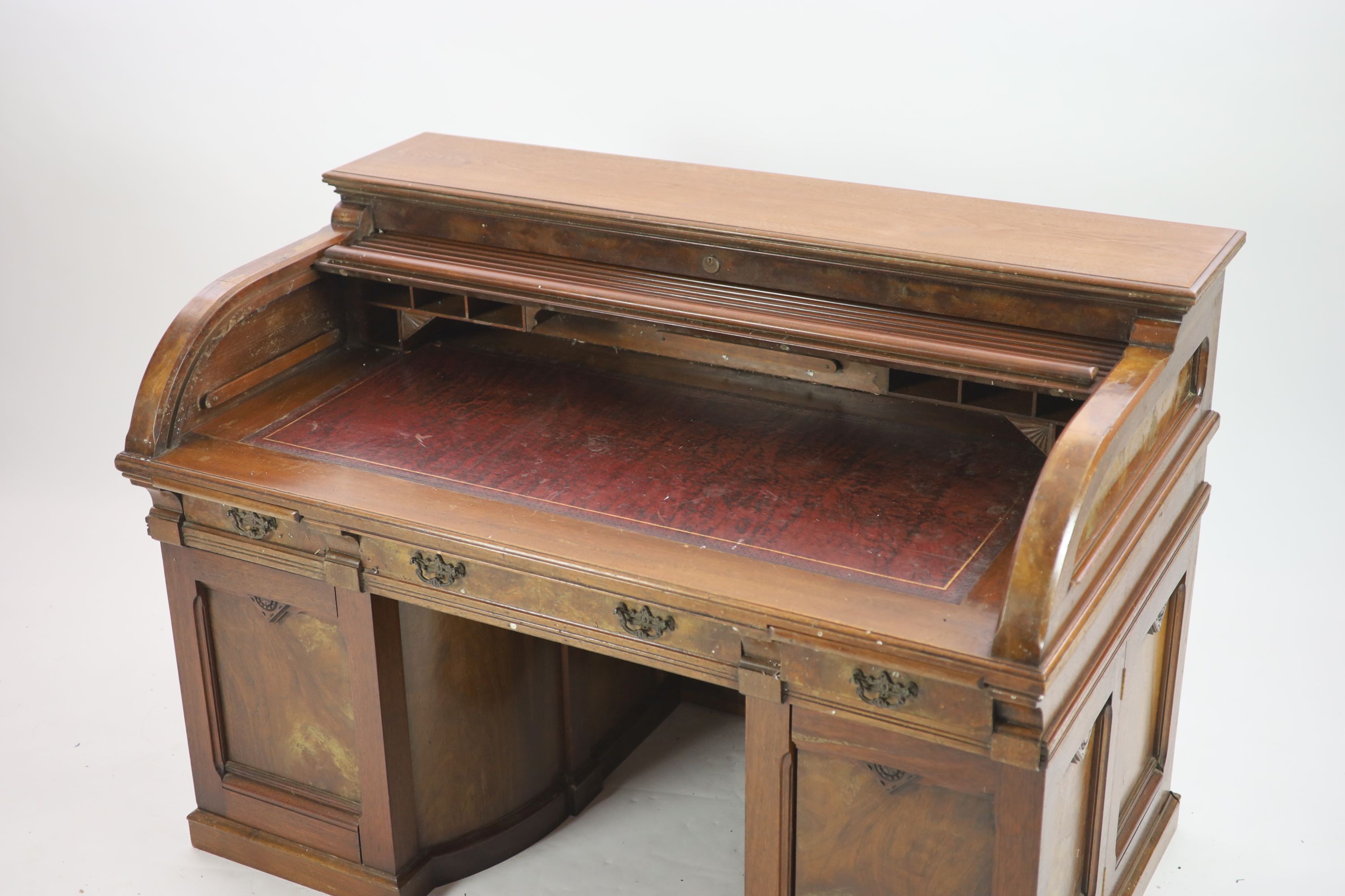 A late 19th century American walnut and mahogany 'Wootton' desk, W 150cm D 88cm H 109cm